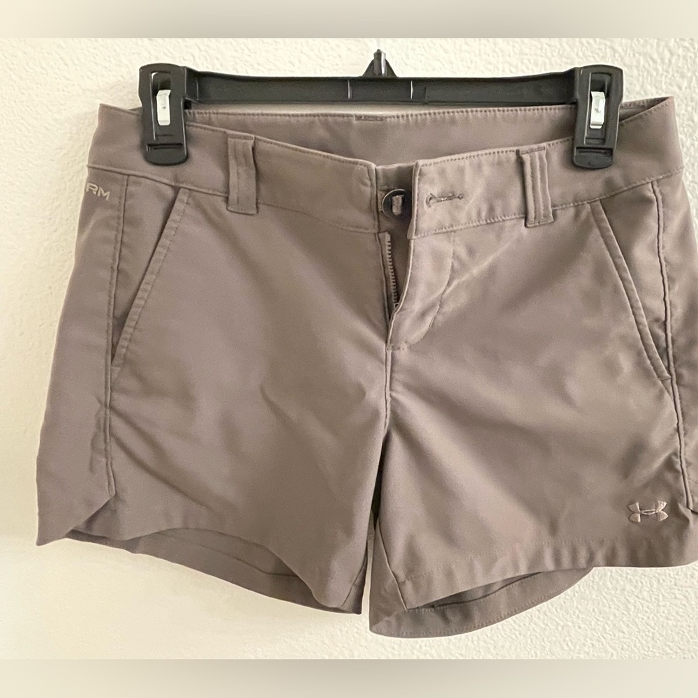 Under Armour shorts.  Excellent condition. “Storm” fitted golf shorts.  Size 4.